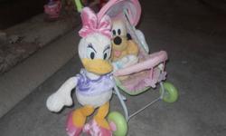 cute and in great condition........large daisy, pluto and a doll stroller for sale! asking only $15.00. comes from a smoke free home