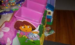 Dora toy/craft organizer, with 9 bins 3 on each row. Great condition. $35.00 (guelph)