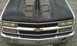 Selling my hood from my 96 chevy 1500 reason for selling, buying an new truck ... The hood has custom painted flames and skulls
Front hood covers are missing but looks better with out them!!!
Small dent on the front not to bad you can't no test it from