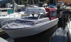 This boat has been done top to bottom and only needs a few small things done, running lights and one wiper.
New rebuilt 351 windsor tests great, even on all cylinders, new floor, new aluminum fuel tanks, new top, 9.9 merc backup with connection system for