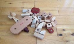 Such a fabulous building toy - contains all wooden pieces that "snap" together with embedded magnets. They can build and rebuild - all aircraft pieces with wings, noses and propellers. See attached link for an idea of what this toy is: