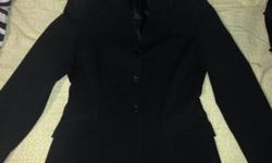 Plain black show jacket only worn a dozen times, dry cleaned and always kept in a jacket bag. Too small for me now. Size 8 ladies. Great little jacket. Originally $160 new.