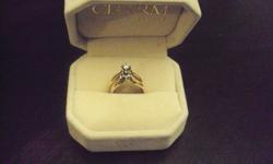 Engagement / Wedding Band Set. Cost over $5,000 will sell for $1,000
Excellent condition
Phone 523-4141