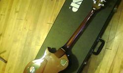 Bought case and guitar a little over a year ago from 'Guitar City' in Kirkland Lake, Ontario. Case is fitted for the guitar , but missing one closing buckel . Guitar is in Great conditon, barely touched . Model No. EC400VF. Asking $450.00 o.b.o. for both,