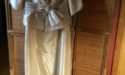 Worn once as mother of bride outfit. 2 piece Can be worn strapless or as a suit. Very good quality champagne colour Size 12-14