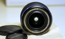 Selling an excellent Olympus 14-42mm lens - the more sturdy Version I with the metal mount. Came with an E-P2 PEN camera that I am selling separately - ask me if you are interested. It's a used item, so on close inspection you might find minimal scuffs,