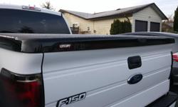 Fiberglass Century Tonneau cover for 2009-2014 f150 with 6.5' bed. Black, like new, everything works perfect. Paint is tuxedo black and looks awesome. New is over $1000
trades for - Wheels/tires, or Canopy for same truck.