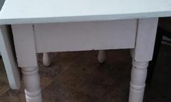 c1894 wooden kitchen table
Needs re-finishing, otherwise in good condition
Both drop leaves work well up or down.