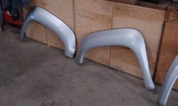 Brand new 2007 to 2011 G.M fender flares painted g.m silver. These were on my truck for about two weeks and decided they just weren't the look I was looking for. Phone-228-7631, 228-2528.