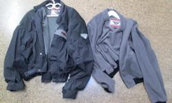 Excellent condition First Gear motorcycle jacket with zip-in fleece liner and armour padding in the back and at shoulders and elbows/forearms. The jacket has a large reflective patch across the back and reflective patches on the sleeves. Well vented for