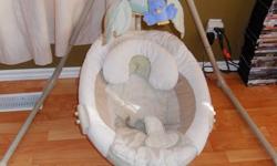 Fisher Price Natures Touch Cradle Swing
 
Our second child has outgrown this swing - but it was a lifesaver for both our kids! Now that she's crawling I need to free up some space in our living room.
 
This one is a model about 7 years old (we got it