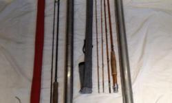 1- 9 ft three piece (plus extra tip) Special Tournament U S patented H.L. Leonard bamboo rod manufactured in the late 30's or early 40's and metal protection case 650
1- 8 ft graphite fishing rod with metal protection case. In like new condition 250