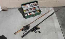 Fishing tackle box with some saltwater lures and many fresh water plugs,spoons, feather hooks, weights and lines. One fishing rod, Daiwan 7600, 7 foot with spring loaded drag and one rod 'Pinnacle' black metal 6'6". Both in good condition.