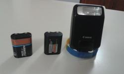 Canon Speedlite Flash 160E and 2 batterys valued at around $15.00,if you need more info please text the given number ,Thanks