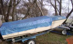 this trailer is 16ft. blue in color, tire size 5.30-12 4 hole rims, the boat is 14ft, fiberglass VANGUARD, has 2-5gal. tanks, new battery, has a 65hp. mercury 650 motor, motor has new shifter and new water pump, new lower leg. new tan tarp for boat ,