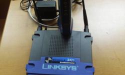 CISCO Linksys Wireless-B Home Router, 2.4 GHz
and
SHAW Cable Modem, blue, SB5102