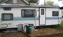 1996 26 ft four winds trailer keept in great condition  has all emenities heat, air conditioning, full bathroom two bunk beds, futon, and its own bedroom with qween size bed  sleeps 7 everything  wooks great new canopy being put on in spring of 2012