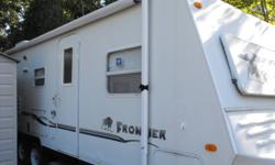 2003 Frontier 28 ft travel trailer.  Sleeps 8.  Includes bunk beds, master bedroom, separate seating and dining area.  Double slide out.  Microwave, fridge, stove in excellent condition.  Purchased 4 months ago, used once.  Paid 11, 500, selling for