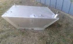 aluminum fuel tank from 16 ft K&C -not sure how many gallons it holds. In good shape Dimensions - 37 inches across front, 28 inches across the back, 9 inches high and 16 inches front to back.