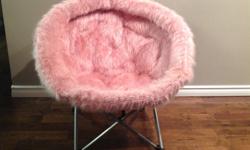 The amazing pink fuzzy fold up chair is great for on the go or staying at home. This is a solid comfortable chair for curling up in and reading a book or watching tv. Suitable for ages 5-13.