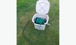 Garden Hose Reel/Box with a lid. I no longer have the hose for sale, just the reel/box.