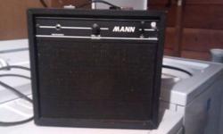 Model 5S5 Mann amp, circa 70s.
This little amp is just around 5 watts and puts out a nice roar. There is just a single volume control and it only takes a little turning up before the amp begins to growl and produce the type of solid state distortion that