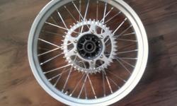 rear wheel from a GAS GAS 1995 JT250 TXT
very good condition, doesn't look like it has had much use
complete with brake disc and sprocket
believe this wheel will fit all models before the gas gas pro models
so all gas gas trials 2001 and earlier
its