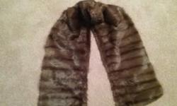 Genuine vintage squirrel stole in excellent condition. Dark brown stole from my great-grandma. Measures 10.5" by 62" . Asking $50. Call 250-597-2174 to see it.
