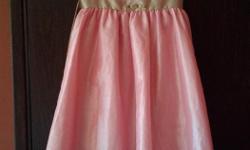 A Jona Michelle girl's size 10 dress. Excellent condition. Daughter has out grown. Asking $50.00 firm.
