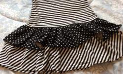 Stripped and poka dot black/off-white dress with bow with sequins size 6X Only worn a couple of times $8.