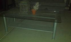 ikea glass end table and coffee table in good shape, just don't use them