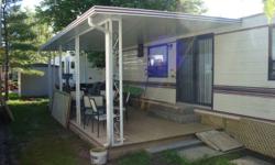 Glendale 36 foot trailer in very good condition. This trailer has two bedrooms and sleeps 6. Full kitchen with frig with freezer, stove, oven and microwave, and kitchen table with four chairs. Livingroom area has new hardwood floors, sofabed, chair and