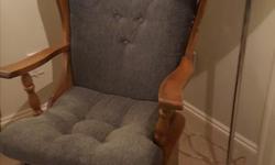 Grey / blue cushions on a glider chair. Excellent working condition, cushions are in decent shape (no stains).