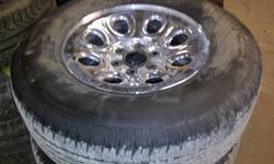 265 70 17  goodyear wrangler a/s with chrome GM wheels  almost new condition. comes with centers