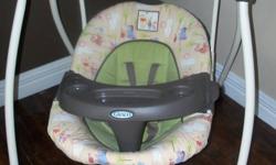 Gently used, great condition Graco Winnie the Pooh baby swing. Has 6 speeds, plays 15 tunes, has nature sounds, a timer and volume control. Has a 5 point harness that can also be used as a 3 point harness and a tray. Also has multiple back adjustments.