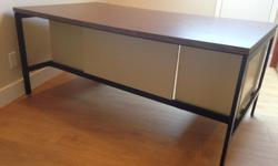 Large - 66" x 36" x 29" high commercial desk, Federal government issue. Walnut laminate top and drawer fronts. 5 drawers -= all work well. You pick up , you'll need a pickup or full-sized van and help.