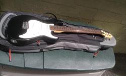 Excellent guitar model MB-1/BK, with Grover machine heads. Nice quality guitar with padded back pack style case