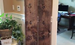These growth charts are stained and measure 9"x6'. They are priced at $40 each. One has an embellishment that reads "All things grow with love".
