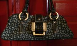 **GUESS** Black Denim Purse with Silver Hardware
Pretty Black Denim Purse by GUESS with faux black snakeskin
5 silver feet on bottom
Bottom of purse measure 13 inches
Handle drop is 8.5 inches
3 pouches inside - 1 for your cell phone, another one is