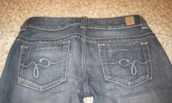 Size 27, gently worn pair of women's bootcut Guess jeans.