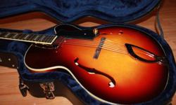 This is as good as it gets for you jazz players and collectors of good stuff! This Guild Newmark series handcrafted in Korea retails for $1500 and has it all, great looks, simplicity, awesome woody tone, light weight, Guild legendary quality. It only has