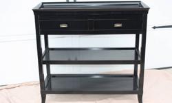 Beautiful Black Lacquer Hallway/Console Table
 
Purchased from Interior Design Warehouse in Burlington, seller of many fine pieces of home furnishings.
Bought only a few months ago for $500 but the wife is changing our interior design.
Top can be removed
