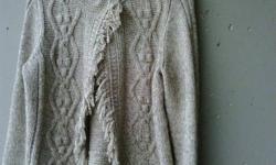 Various hand knit sweaters for sale.
Many different colours, styles and sizes to choose from.
Excellent quality and good prices.
Call any time after 5:00 p.m. to view