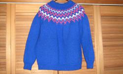 Beautiful hand knitted sweater either for yourself or would make a nice gift. Worn only twice. Looks like new. Size M/L.