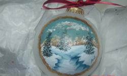 Handpainted glass christmas ornaments. Each one takes about 2 to 3hrs to complete. They are 3" glass balls painted with acrylics, reflecting country scenes. I paint wind swept lakes, country scenes, old barns, stone mill houses, country churches and old