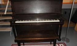59 inches long, 53 inches high and 27 inches wide. A gerhard Heintzman Upright. Great for your child's piano lessons!