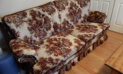 Up for sale is a Hide-a- bed couch. 
The couch is 84" from the outside of arm to arm.
The bed is a double and is in perfect condition. 
The matress is included and is like new - barely used.
The couch color is various shades of beiges and browns.
 
The