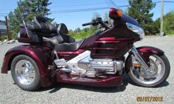 This is a 2007 Honda GL1800 Goldwing the queen of the touring motorcycles with 35,000 kms on the bike
Motortrike kit fitted..... $39500....
Independent rear suspension
True track stabilizer bar
Shaft driven differential
Disc brakes
Heavy Duty driveshaft
