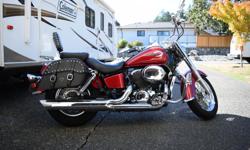 2003 Honda Shadow American classic edition(ACE) This bike is in great shape and shows very well.New tires last year with very low kms on them.New tank leather, pegs,highway pegs,and saddle bags,over $1400 spent on these parts.Bike has 3800kms on it and