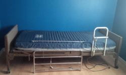 one used electric hospital bed and mattress. asking $400.00. call Wayne at 902-859-2204.
